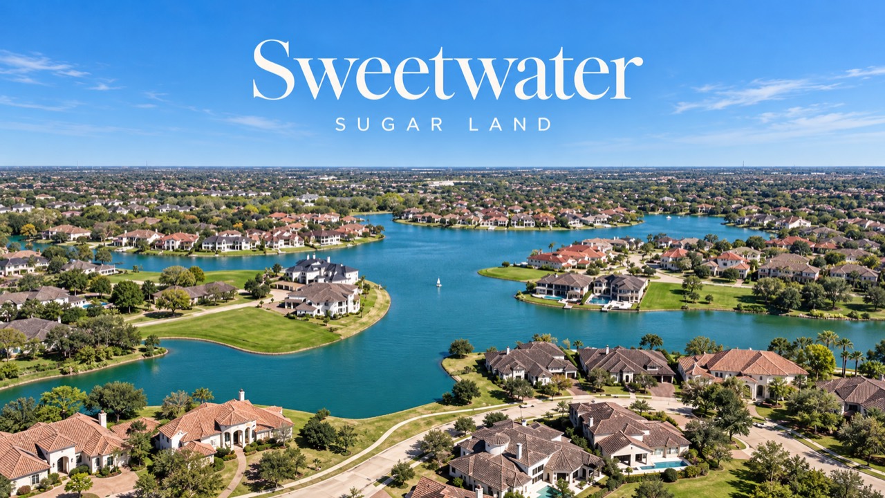 Aerial view of lakeside homes with Sweetwater Sugar Land lettering